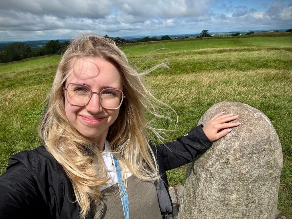 Touching the Stone of Destiny at the Hill of Tara in Ireland
