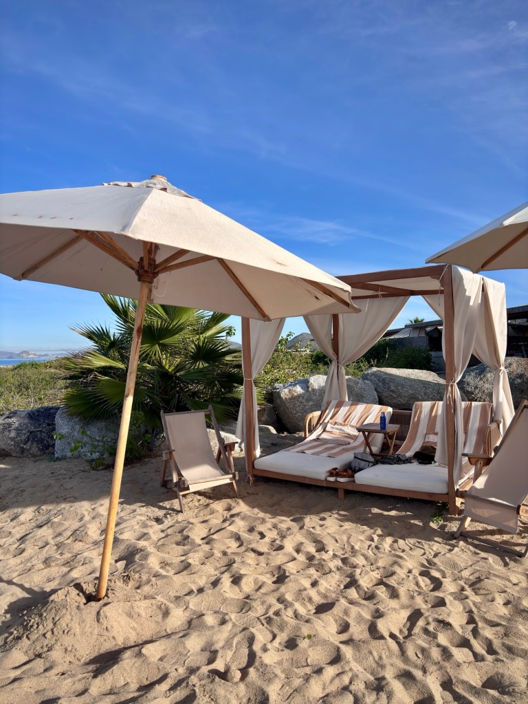 Lounge area at the infinity pool at Tierra Sagrada Beach Club by Cabo Adventures in Cabo San Lucas, Mexico